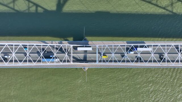Top view of a bridge crossing a wide river in Europe