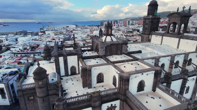 Aerial view over the back of Las Palmas Cathedral and the city in the background. Gran Canaria.