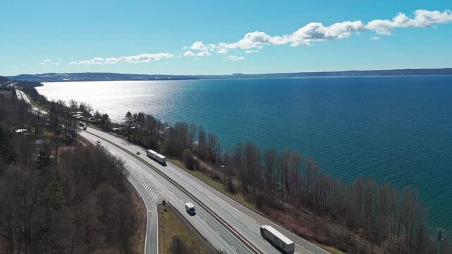 "Aerial view of E4 highway running along V&auml;ttern lake in J&ouml;nk&ouml;ping, Sweden"