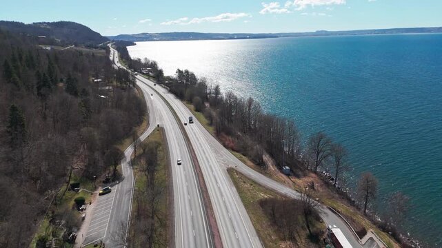 "Aerial view of E4 highway running along V&auml;ttern lake in J&ouml;nk&ouml;ping, Sweden"