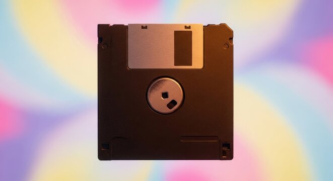 Retro black floppy disk on colorful blurred background