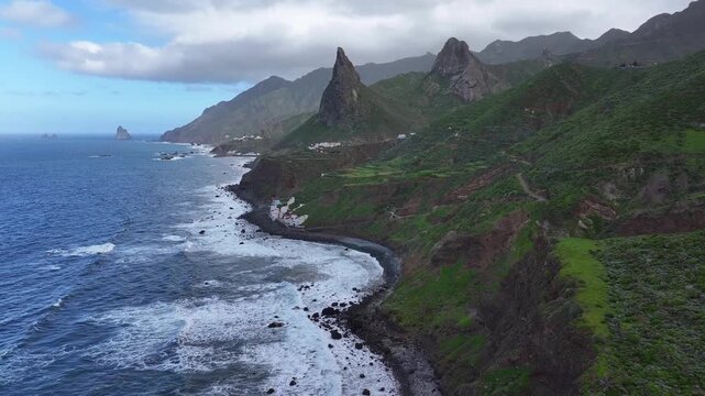 Landscape of Anaga Rural Park near the village of Taganana and the Roque de Las Animas cliff. Tenerife. Canary Islands. Tenerife. Aerial video. 4K 50fps.