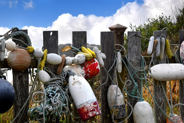 Fence Holds Retired Fishing Floats © Bonita