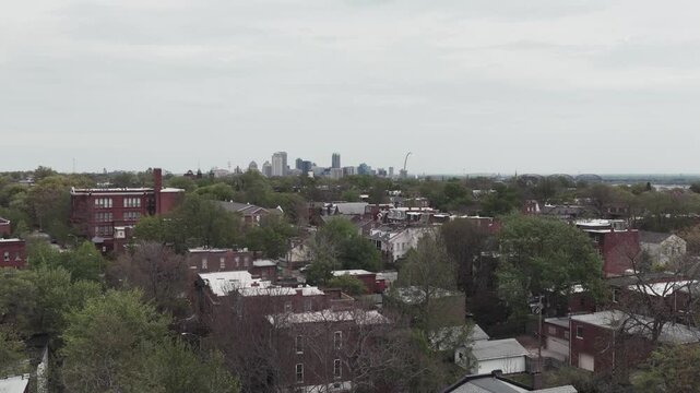 Cityscape view of Saint Louis, MO, with skyscraper buildings and the highway durying a beautiful spring day.