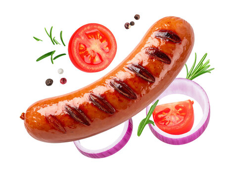 Falling grilled sausages isolated on white background, flying bratwurst with grill marks cutout for BBQ, garden party and fast food compositing