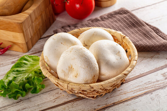 Raw white champignon mush heap
