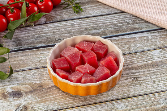 Raw tuna fish cubes heap