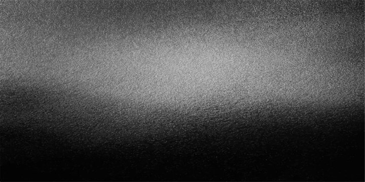 Dark grunge black metal texture with a rough industrial surface pattern and a grey vintage wall material backdrop