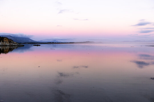 lagoon and reflection on water after sunset, Hermanus, South Africa