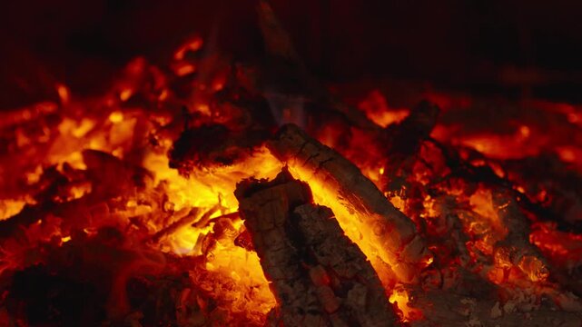 Wood burning in a cozy fireplace at home 4k footage