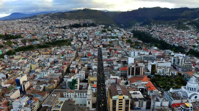 Ambato, Ecuador, 15-5-2021: Aerial view over the main street of the city full of traffic during the day
