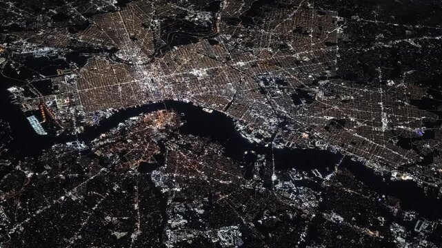 Flying over Philadelphia city at night with urban lights satellite view from space based on Nasa imagery