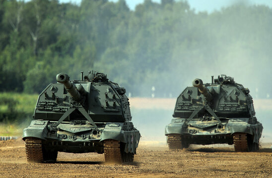 Tanks drive during war preparation between Iran and Israel showing military vehicles mobilization and armored forces deployment amid escalating tensions