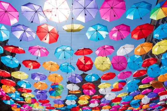 A multitude of colorful umbrellas on the clubs and bars of Catania to protect from the May sun