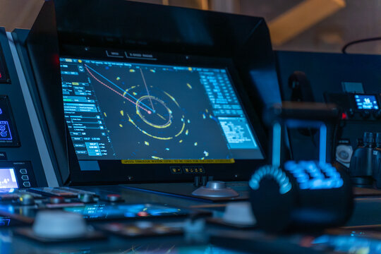 ECDIS radar display showing vessel navigation track with joystick control