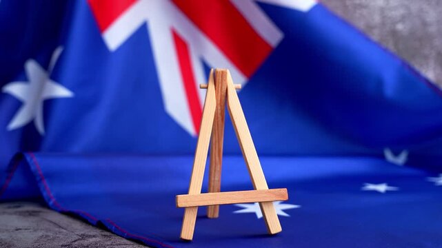 Australian flag and text 2027 trendy template for upcoming year campaigns. Patriotic design marking 2027 beside national flag. Concept of future vision and planning ideal for annual report or goal