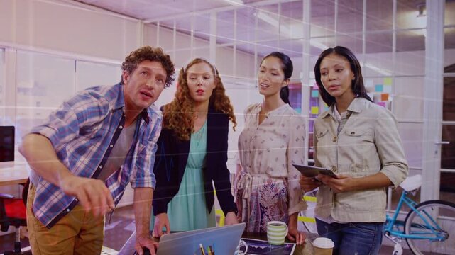 Male team lead pointing above laptop and causing animated planning highlights for business decision