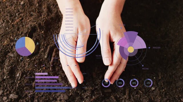 Hands entering view and moving down, cupping soil as HUD charts responding and updating farm data