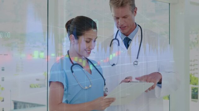 Doctor leaning pointing pen, nurse holding chart, checking medical notes as faint graphs over chart