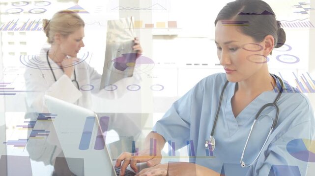 Nurse typing on laptop initiating medical charts sliding over doctor studying X-ray for diagnosis