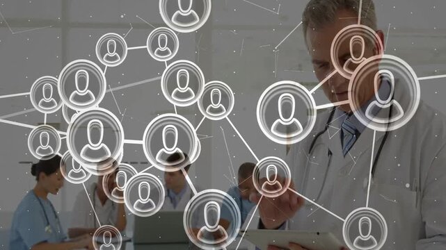 Doctor tapping tablet clinic meeting network map growing obscuring shifting as team planning care