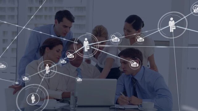 Business team leaning at laptop, pulsing network icon popping and growing links for planning