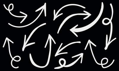 Fototapeta premium Hand drawn white arrows pointing different directions on solid black background