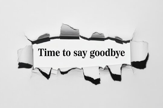 Time to say goodbye message revealed through a torn paper hole isolated on white background