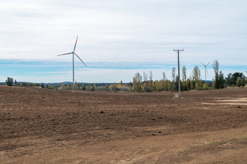 wind turbines in a desert landscape © Rodrigo