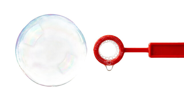 a large soap bubble floating next to a red bubble wand isolated on transparent background