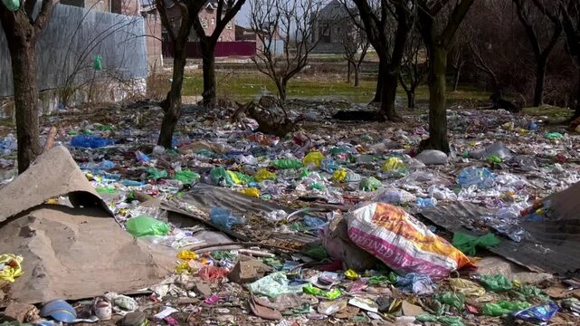 Trash pollution crisis harming earth through water pollution air pollution plastic polythene diapers waste destroying environment threatening health ecosystems future generations worldwide