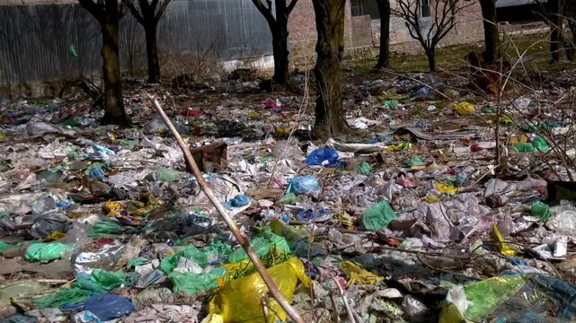 Trash pollution crisis harming earth through water pollution air pollution plastic polythene diapers waste destroying environment threatening health ecosystems future generations worldwide