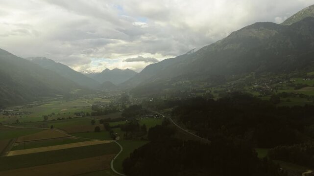 Establishing drone shot of the scenic Draun Valley under cloudy skies of Tyrol