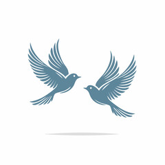 Fototapeta premium Two elegant blue birds gracefully soaring in flight against a white background