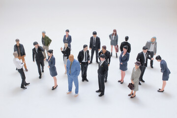 Obraz premium Group Of Miniature Business People Arrangement