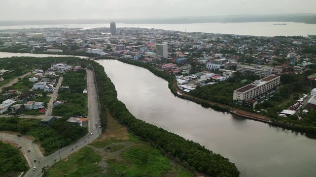 Iloilo River Through Urban Development In Iloilo City, Philippines. Aerial Shot