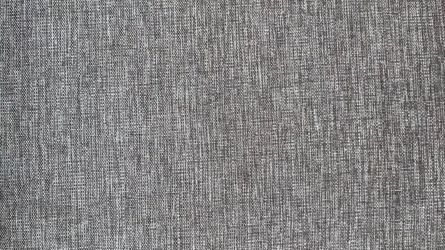Texture of sofa. top view. detail. texture. gray, grey. dark, black. copy space, empty, free, negative, text, design. pattern. background. fabric. wallpaper. material. chair. high ang