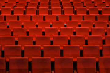Obraz premium Red empty seats in the theater auditorium