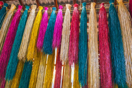 Colorful Dyed Raffia Fibers Hanging to Dry