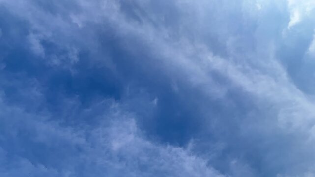 The dark sky with heavy clouds converging and a violent storm before the rain. Bad or moody weather sky and environment. carbon dioxide emissions, greenhouse effect, global warming, climate change. 