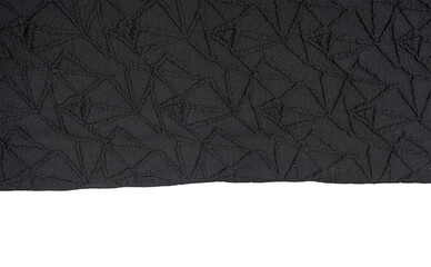 Fototapeta premium Dark gray crumpled texture background with subtle triangular quilt pattern and copy space, suitable for luxury, fashion, upholstery, and abstract design.
