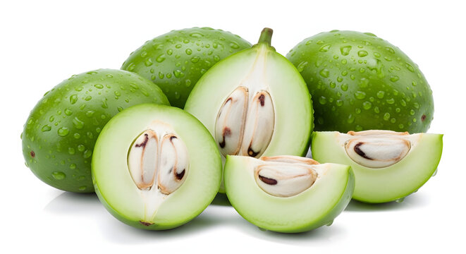 Fresh green ambarella kedondong fruits whole and sliced into wedges with moisture isolated on a bright white background