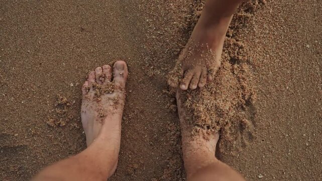 Sunset over tranquil sandy beach. Calm waves meet sandy shore at dusk. Gentle sea kisses sandy beaches under setting sun. Serene evening by seaside as sunset casts warm glow on shore