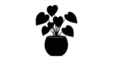 A black silhouette of a heart shaped philodendron plant in a pot © MdEmran