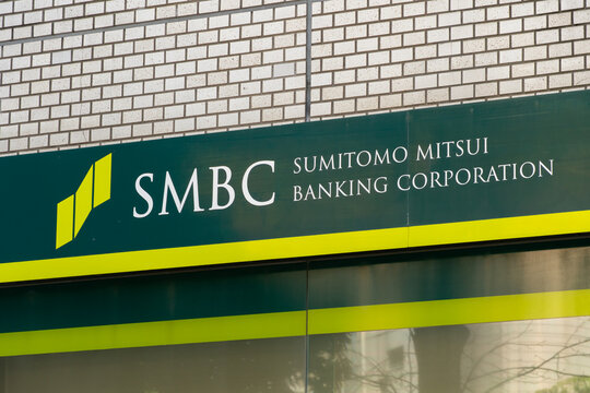 TOSHIMA, TOKYO, JAPAN - APRIL 3, 2026: A horizontal branding logo sign for Sumitomo Mitsui Banking Corporation (SMBC) in the Toshima district of Tokyo.