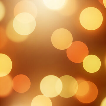 Soft bokeh light background with glowing circles, warm tones, elegant and minimal
