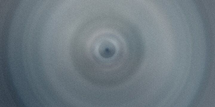 Abstract radial gradient with grainy texture in cool blue and grey