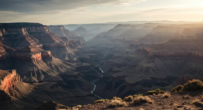 A dramatic, desolate landscape featuring a deep gorge shrouded in mist, symbolizing silent emptiness and the unresponsive void of an echo blank, canyon, quiet, shadow