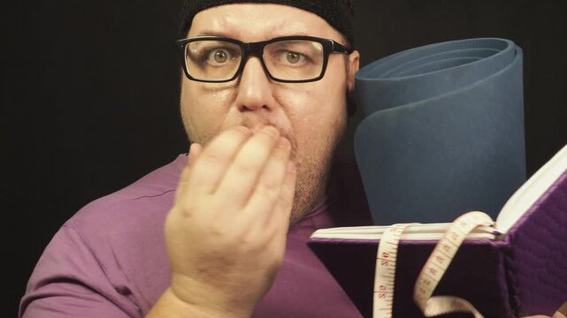 funny fat man in sports clothes doing exercises.
