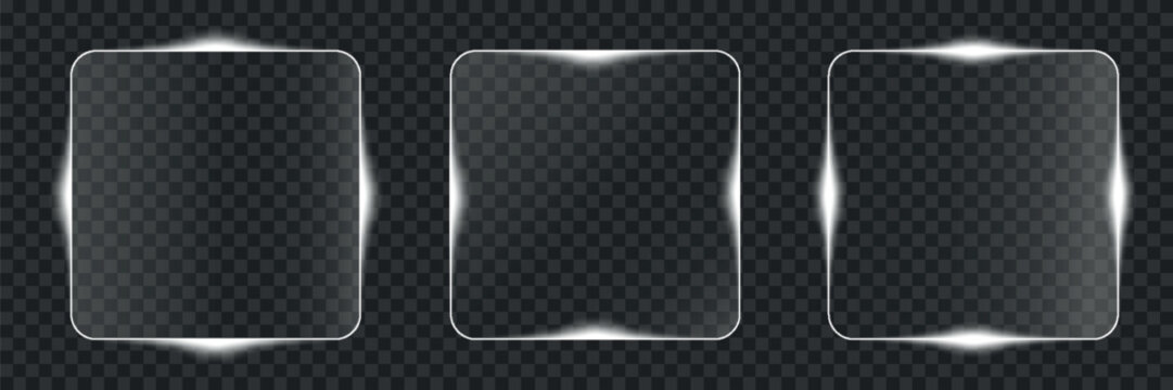 A rectangular glass or plastic frame with a polished silver border is displayed against a dark textured background